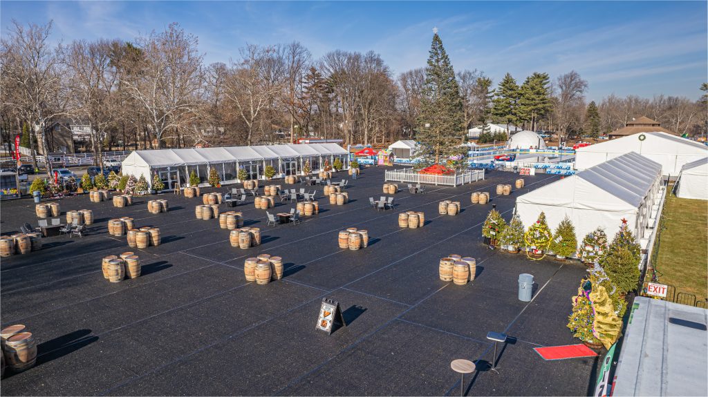 From Empty Field to Festival Grounds: Executing a Big Event Tent Rental at Scale Big event tent rental winter festival by Main Attractions NJ
